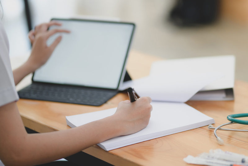 clinician working at desk