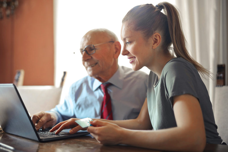 man and woman at laptop