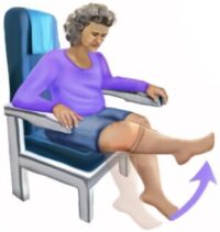 Elderly patient sat down in chair doing leg exercises